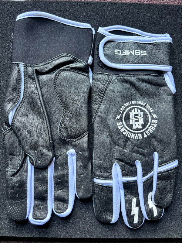 White and black leather gloves.